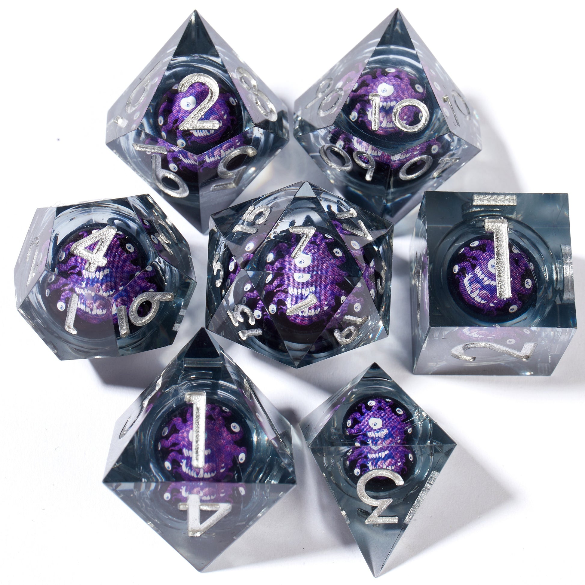 Trapped Beholder Liquid Core 7pc Dice Set – Five Gemstone Variants